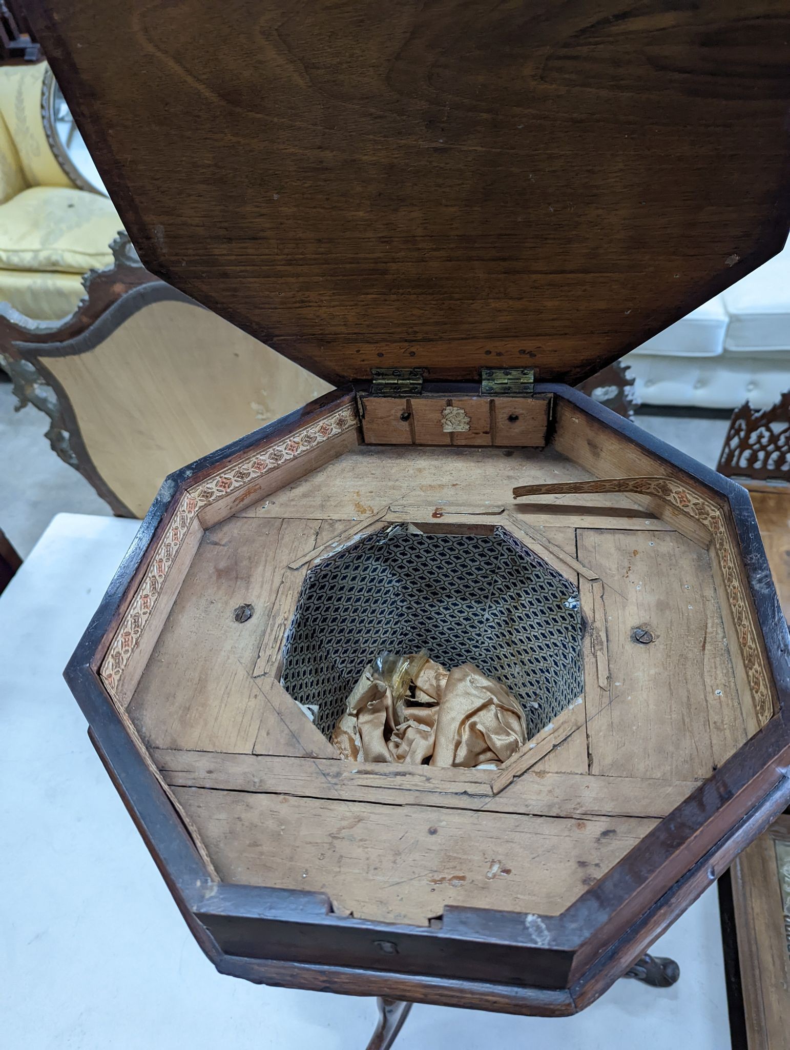 A Victorian marquetry inlaid walnut octagonal trumpet work box, width 41cm, height 74cm